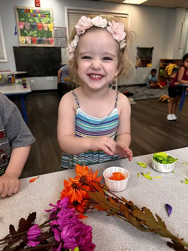 Child playing with Arts and Crafts at Scribbletime